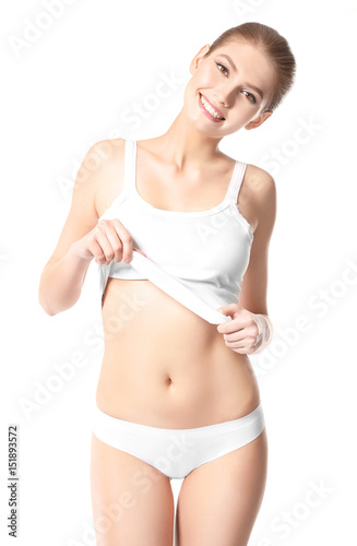 Beautiful young woman on white background. Epilation concept