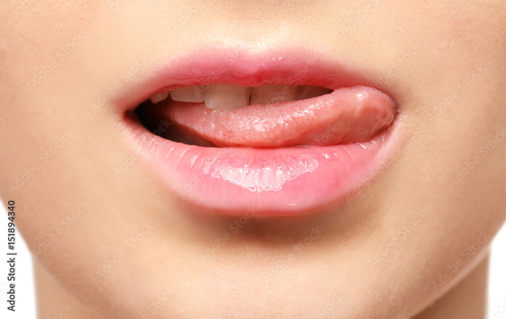 Naklejka premium Lips of beautiful young woman, closeup