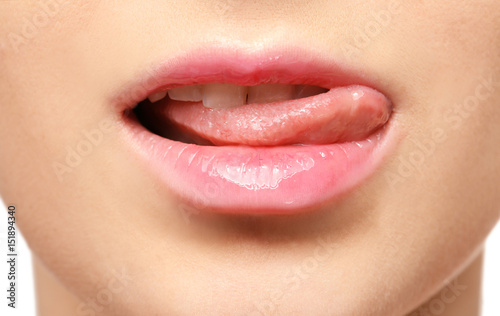 Lips of beautiful young woman, closeup