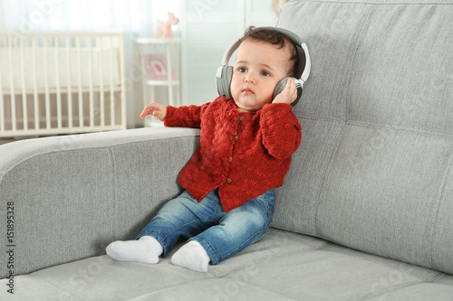 Cute little baby with headp...