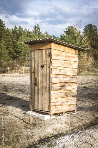 Wooden toilet in a village
