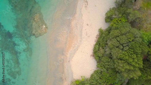 Wallpaper Mural Aerial video shot by a drone of a turquoise sea in Italy. Beautiful beach of the Emerald coast in Sardinia. Torontodigital.ca