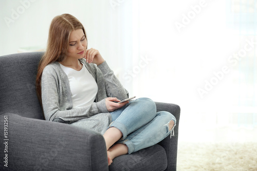 Beautiful young woman with ...