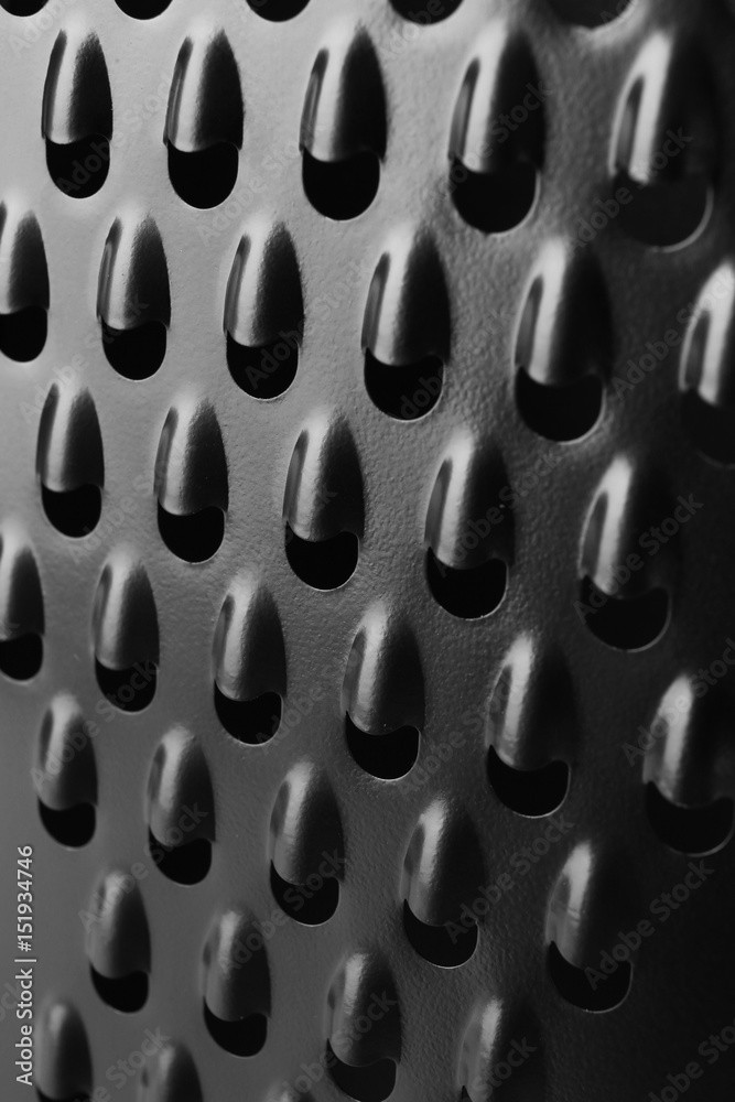Closeup view of metal grater Closeup view of metal grater