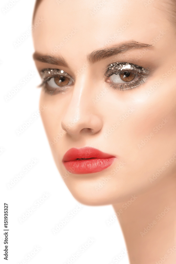 Beautiful young woman with holiday make up on white background Beautiful young woman with holiday make up on white background