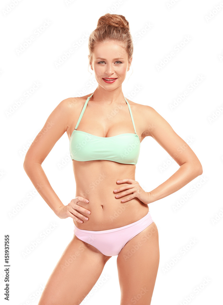Beautiful young woman in swimsuit on white background Beautiful young woman in swimsuit on white background