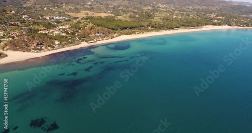 Wallpaper Mural Aerial shot of a beautiful beach on Elba island with its  gorgeous paradisiac sea in Tuscany, Italy, 4K Torontodigital.ca