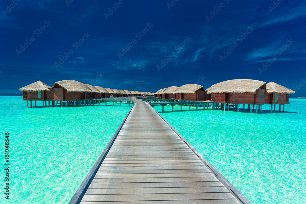 Overwater villas on the tropical lagoon, Maldives