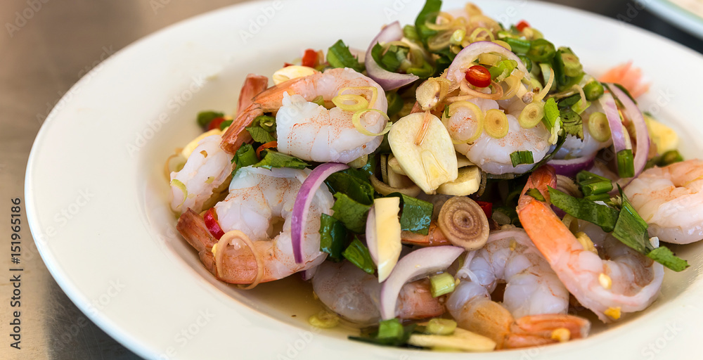 mixing seafood salad mixing seafood salad