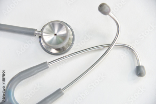 stethoscope medical equipment on white.