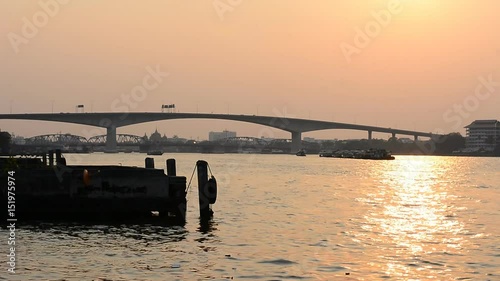 Thai transportation, boat on the Chaophaya river under the beautiful at sunset in Bangkok, THAILAND, 28 Febuary 2017 photo