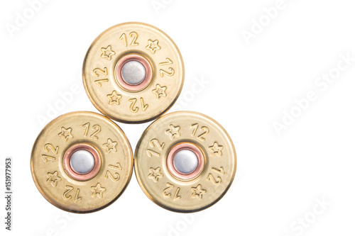 the concept of the three bullets of the 12th caliber for hunting rifles isolated on a white background