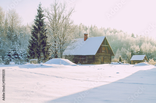 Old house on the river shore in the Gaujas National Park, Latvia photo