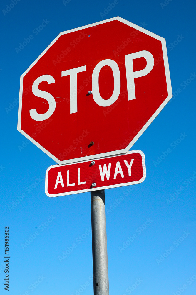Stop Sign with Blue Sky in the Background Stop Sign with Blue Sky in the Background