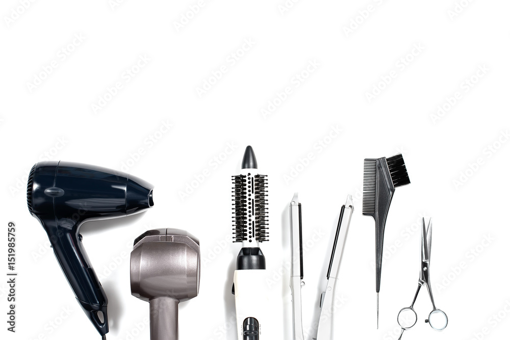 Various hair styling devices on white background, top view Various hair styling devices on white background, top view