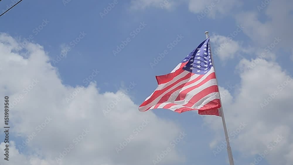 United States flag.have blue sky background. United States flag.have blue sky background.