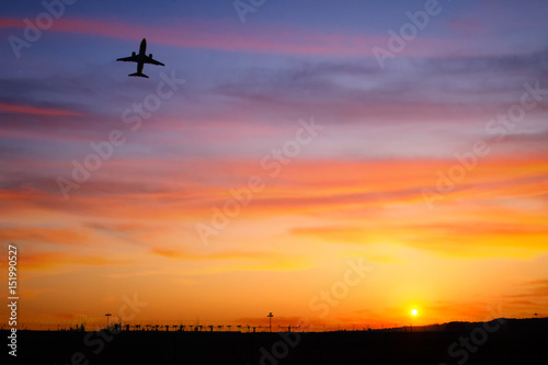 airplain flight during sunset 
