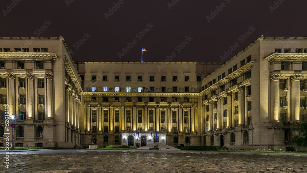 Beautiful night view of the facade of the Ministry of Internal Affairs in the historical center of Bucharest, Romania