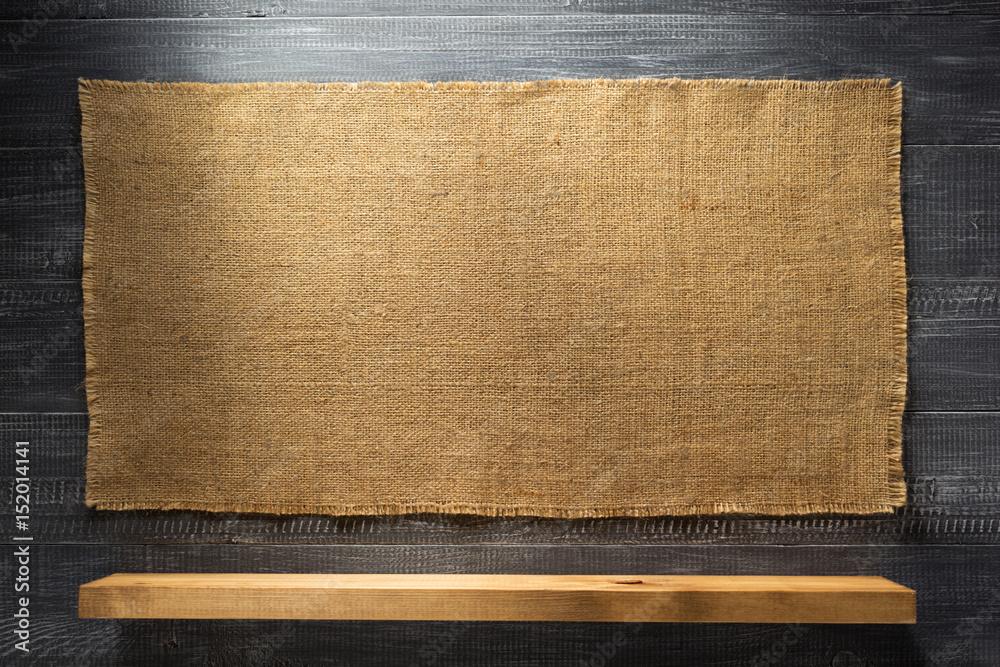 Wall Mural wooden shelf at black wall background