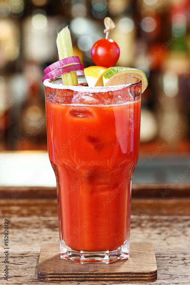 Bloody Mary garnished with cherry tomatoes and celery Bloody Mary garnished with cherry tomatoes and celery