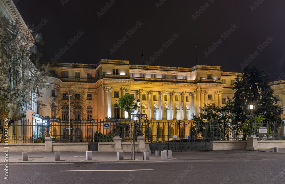 Beautiful night view of The Royal Palace known as Palace of the Republic on Calea Victoriei street, historic center of Bucharest, Romania