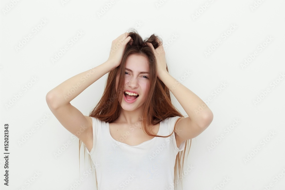 A young emotional woman, isolated on white background A young emotional woman, isolated on white background