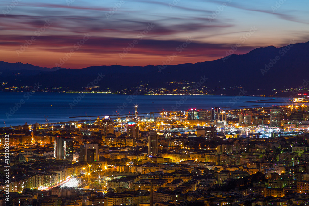 Obraz premium GENOA (GENOVA), ITALY, MARCH 10, 2017 - Aerial view of the city of Genoa (Genova) at dusk.