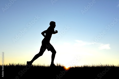 Runner in silhouette