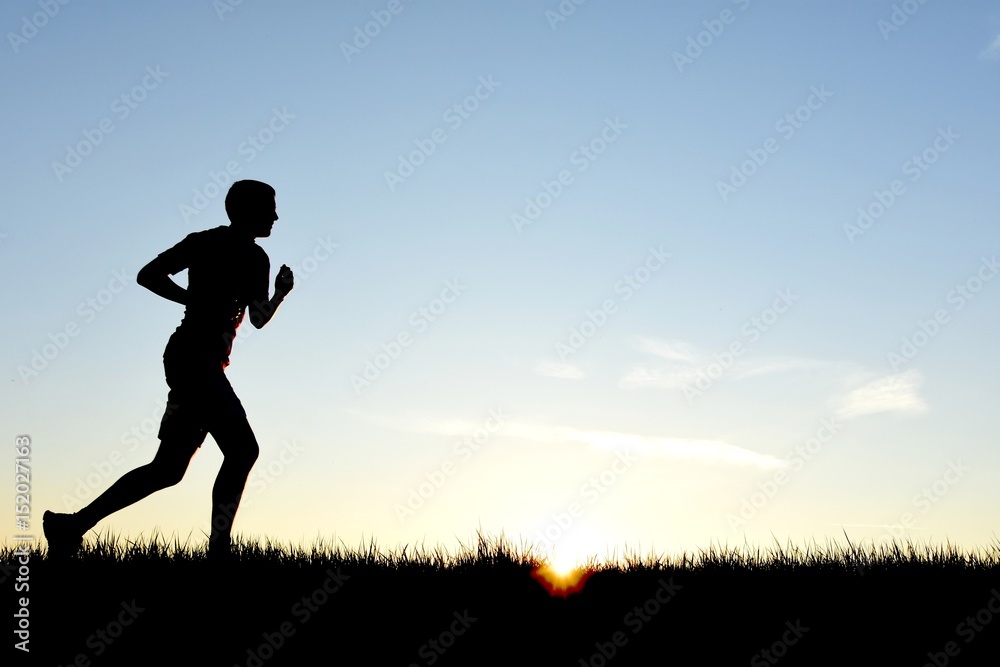 Runner in silhouette