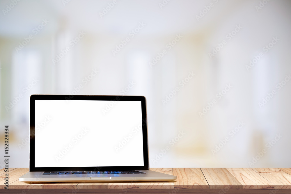 Laptop on wood desk at office background. For Graphic display montage. Laptop on wood desk at office background. For Graphic display montage.