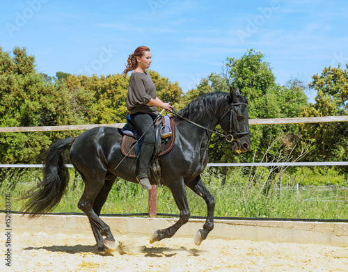 riding woman on stallion