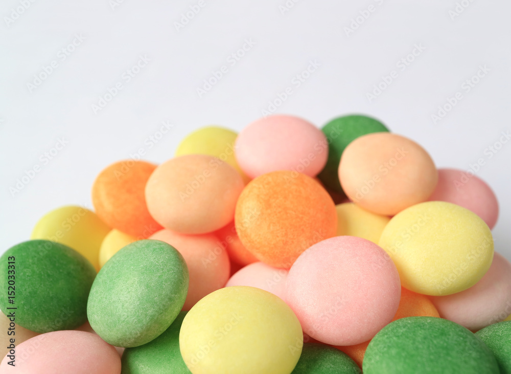 Pile of Closed Up Multi-Colored Round Candies with Selective Focus Pile of Closed Up Multi-Colored Round Candies with Selective Focus