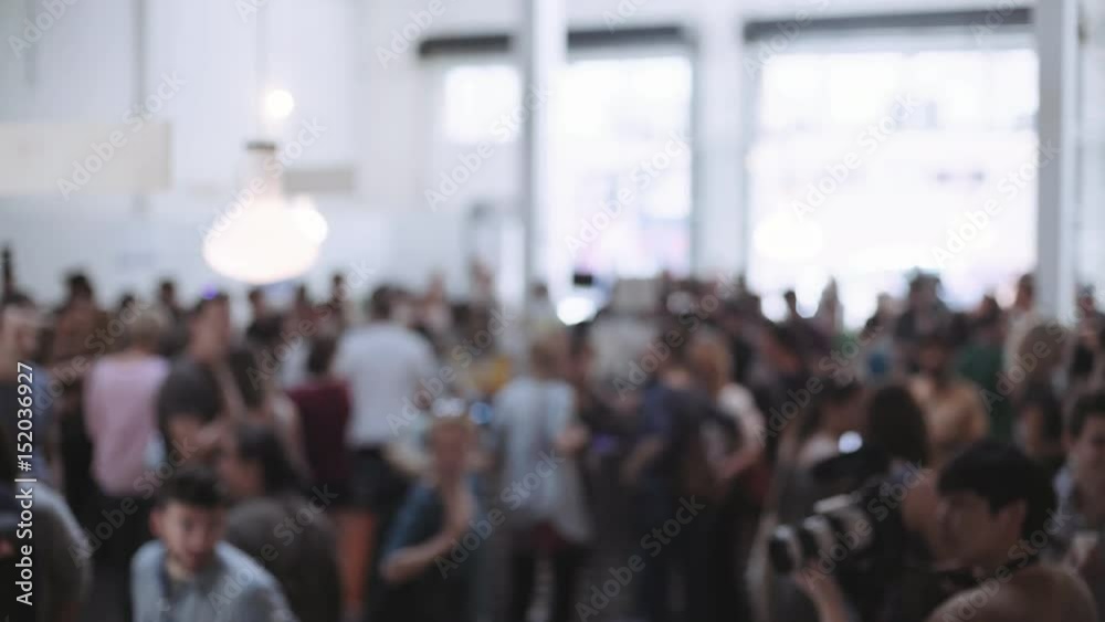 Incredible enormous open space full of light full of people on a weekend event festival food market or start up company gathering