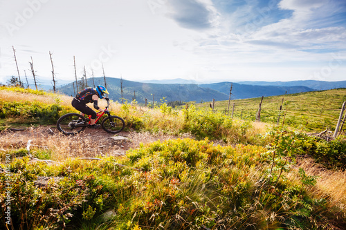 Mountain landscape with MTB rider