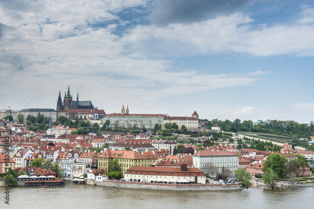 Prague Castle and Saint Vitus Cathedral under the river Vltava. Panoramic view of the Old Town of Prague. Czech Republic