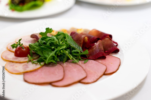 cold meats with rocket leaves