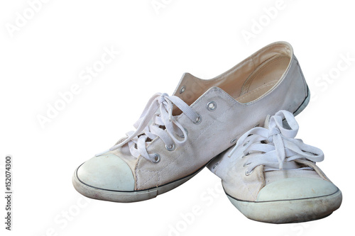 Old white sneakers on white background © BNMK0819