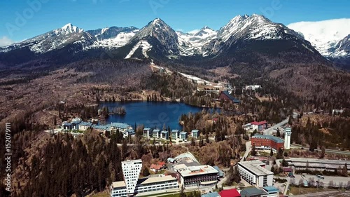 Flight over Strbske Pleso resort in High Tatras mountains, Slovakia photo