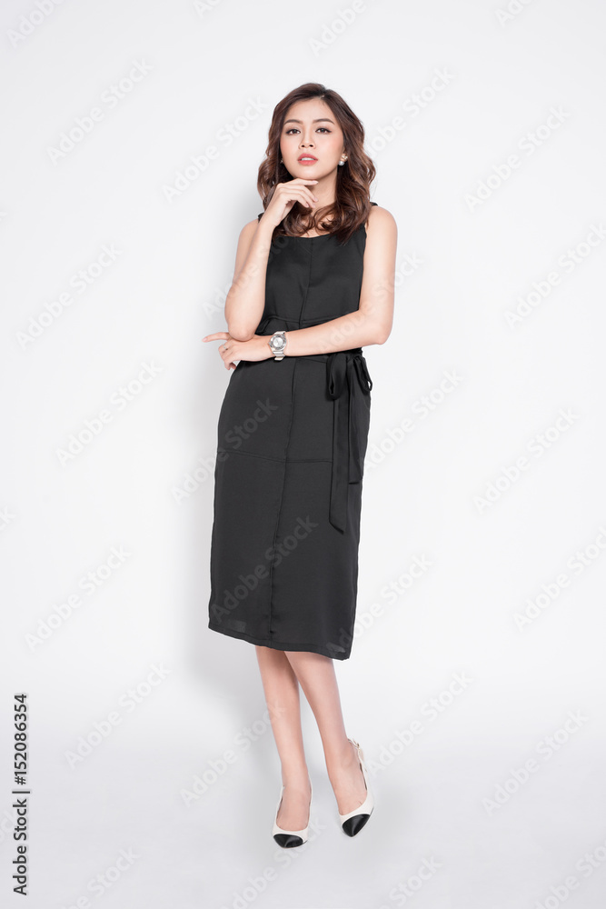 Full length of beautiful stylish asian woman in elegant casual black outfit posing Full length of beautiful stylish asian woman in elegant casual black outfit posing