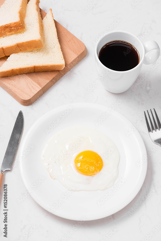 Top view of traditional healthy easy quick breakfast meal made of fried eggs served on a plate. Top view of traditional healthy easy quick breakfast meal made of fried eggs served on a plate.