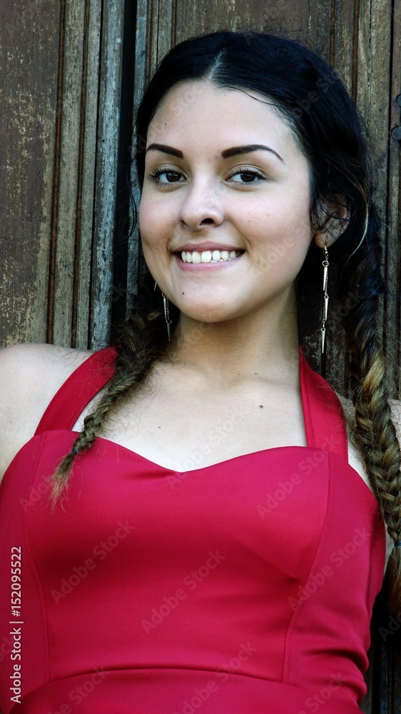 Fototapeta premium Beautiful Teen Girl Wearing Red Dress
