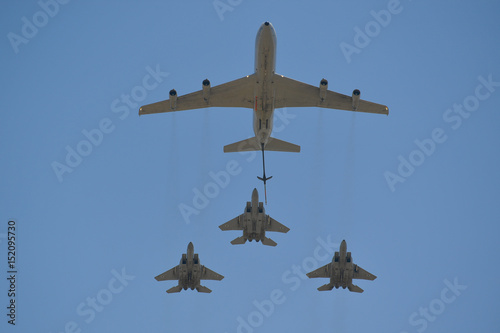 A military refueling plane refuels three F-15s in the air during Israeli 69st independent day