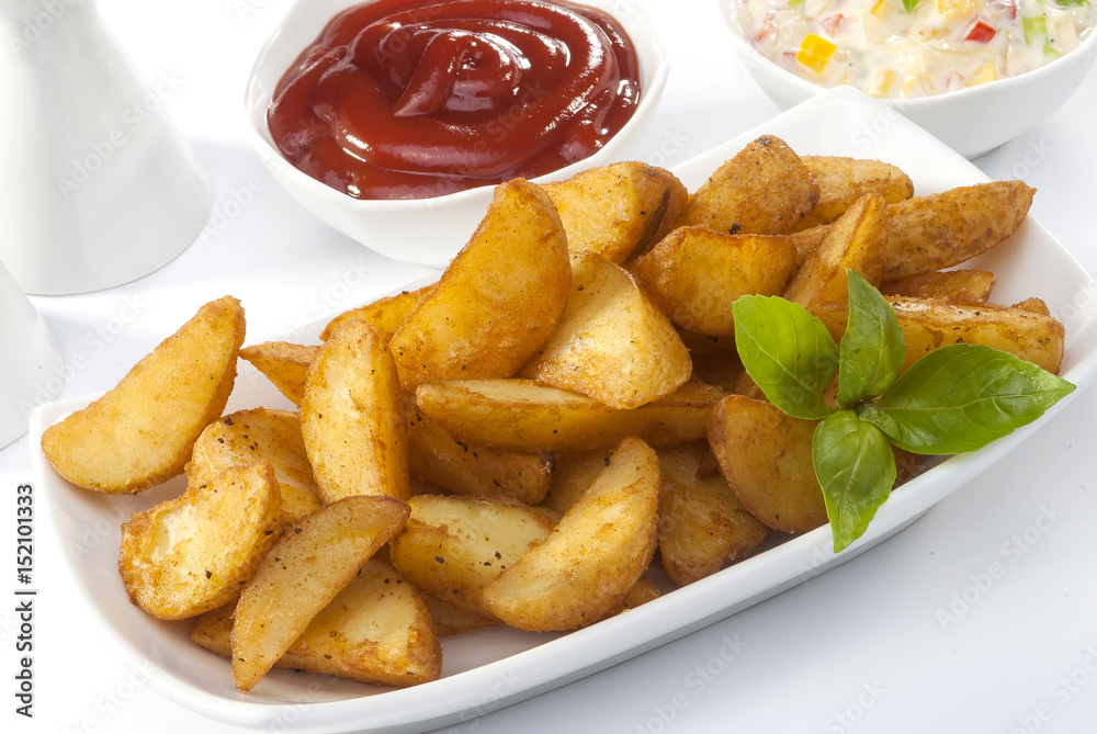 Fried potato wedges with coleslaw & ketchup with basil leaf Fried potato wedges with coleslaw & ketchup with basil leaf