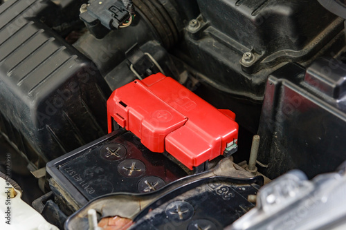 Car battery terminal with red positive polarity