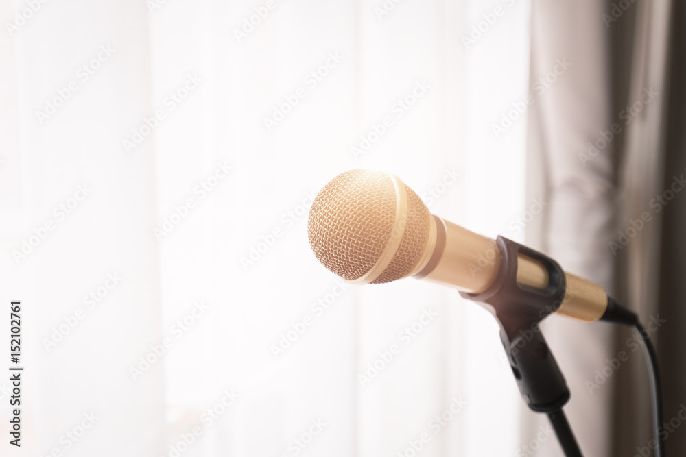 Fototapeta premium Microphone with bright light from window