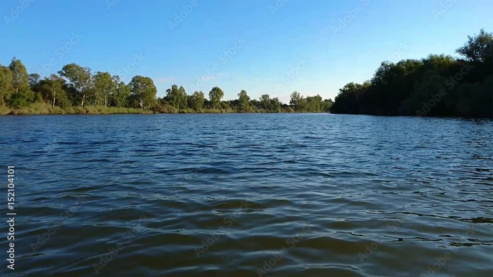 Fast moving water. View from canoe looking back on Vaal River in South Africa. Border North West Provice and Free state Fast moving water. View from canoe looking back on Vaal River in South Africa. Border North West Provice and Free state