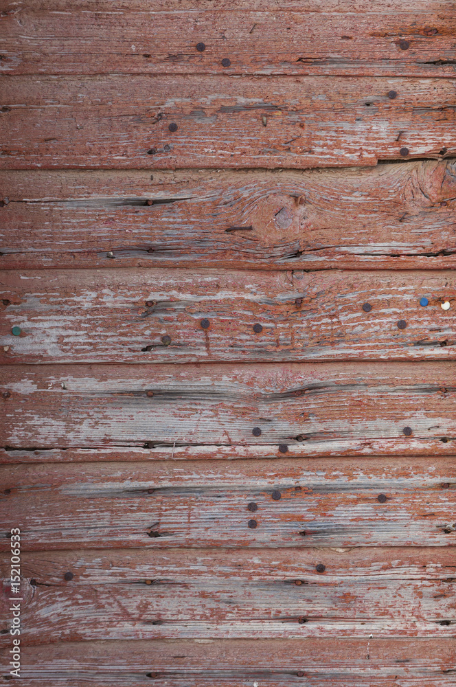 Fototapeta premium very old planks with rusty nails and peeling red paint