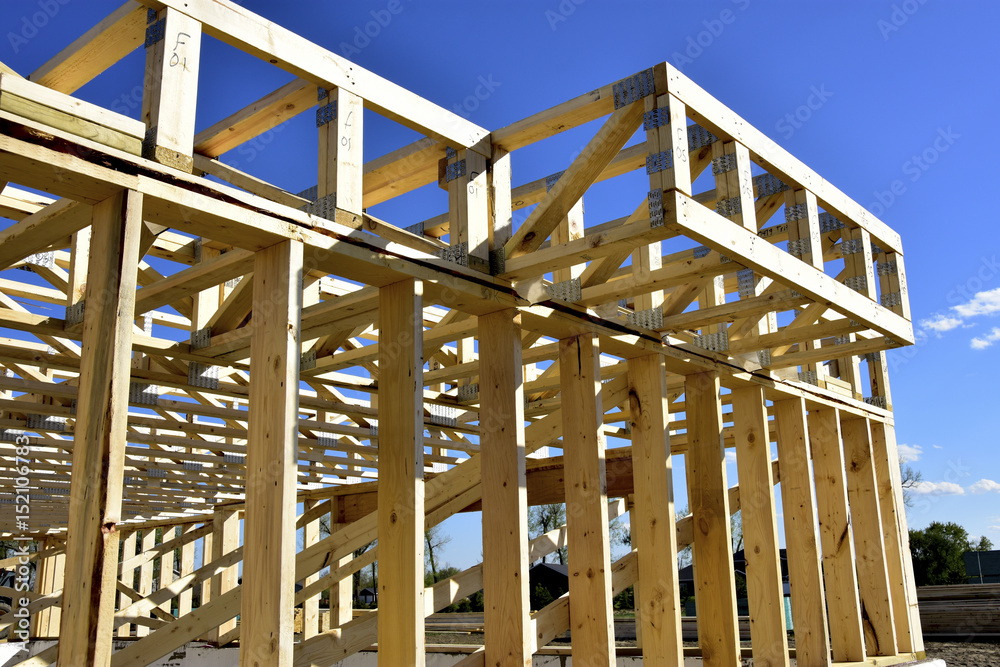 Obraz premium New wood frame home under construction.