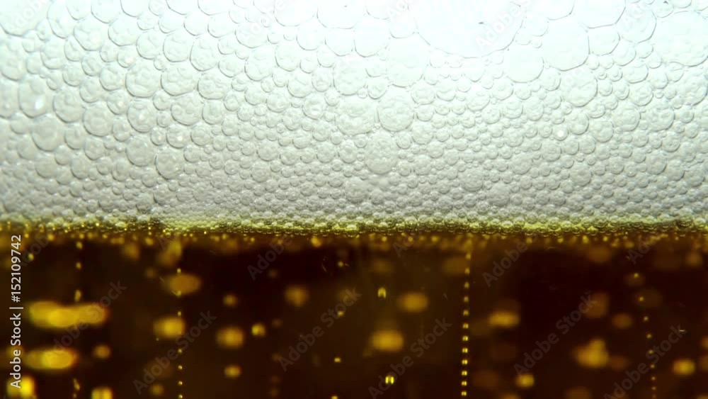 Macro plan of beer with bubbles