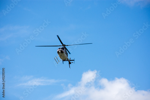 Helicopter flying the blue sky